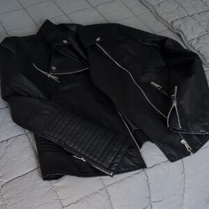 Edgy Black Biker Jacket with Silver Accents